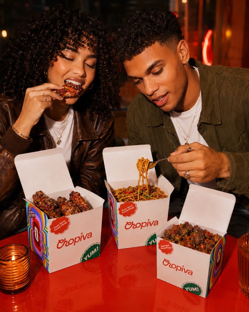 Couple sharing Chopiva boxes over dinner